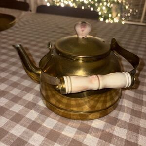 Elegant Gold Teapot with White Handle